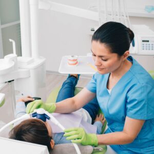 Covington dentist performing comprehensive exam